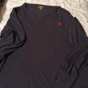 Polo long sleeved t shirt.  Black in color x large